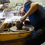 Phil Rogers working in his pottery 2019